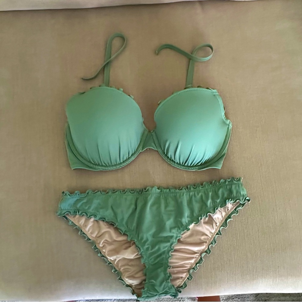 Bathing suit top size 34DD bottoms medium 
Cover up